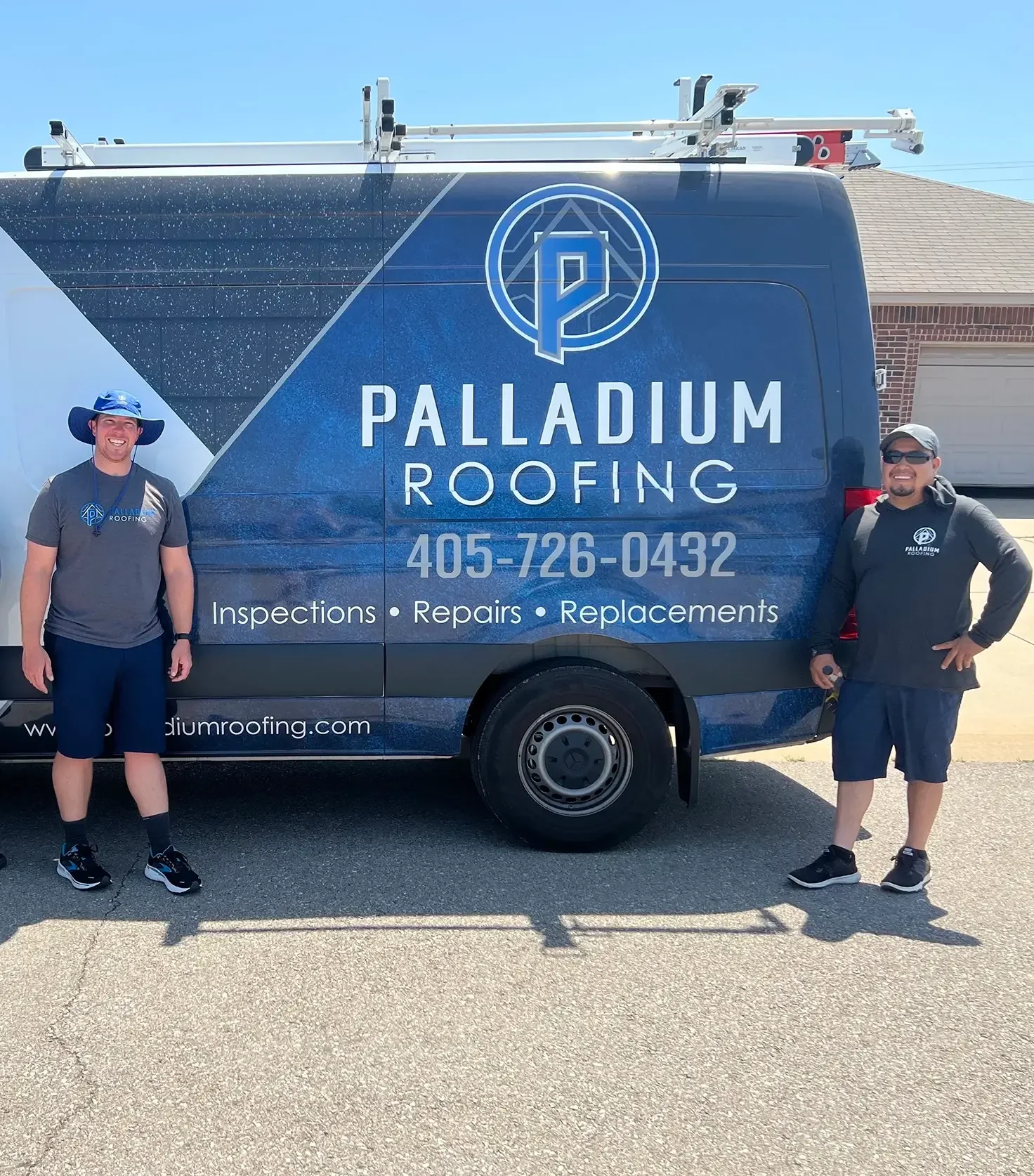 Palladium team next to Palladium Roofing van