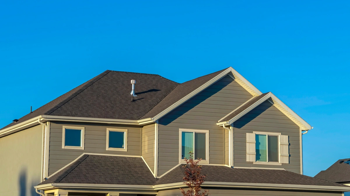 hip roof of large house-shingles roof cost