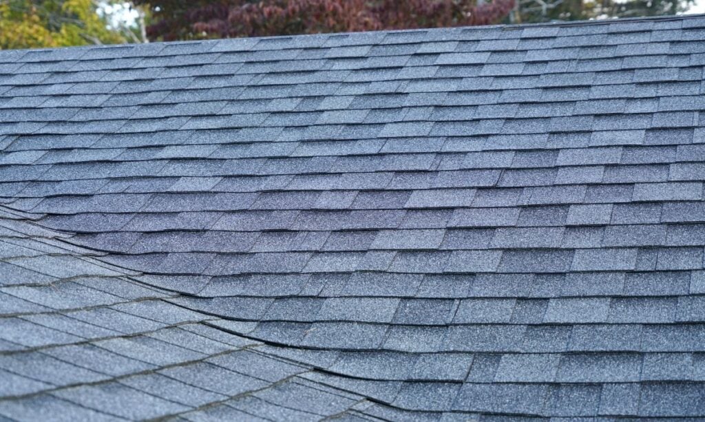 close up on new installed roof shingle