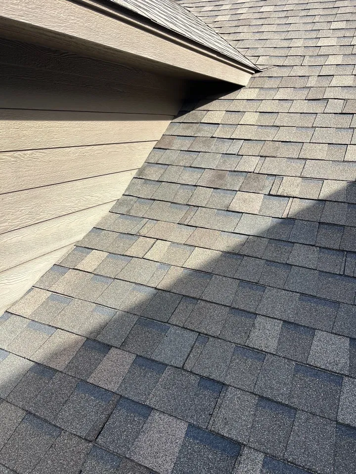 Close up view of roof shingles installed on Norman OK home
