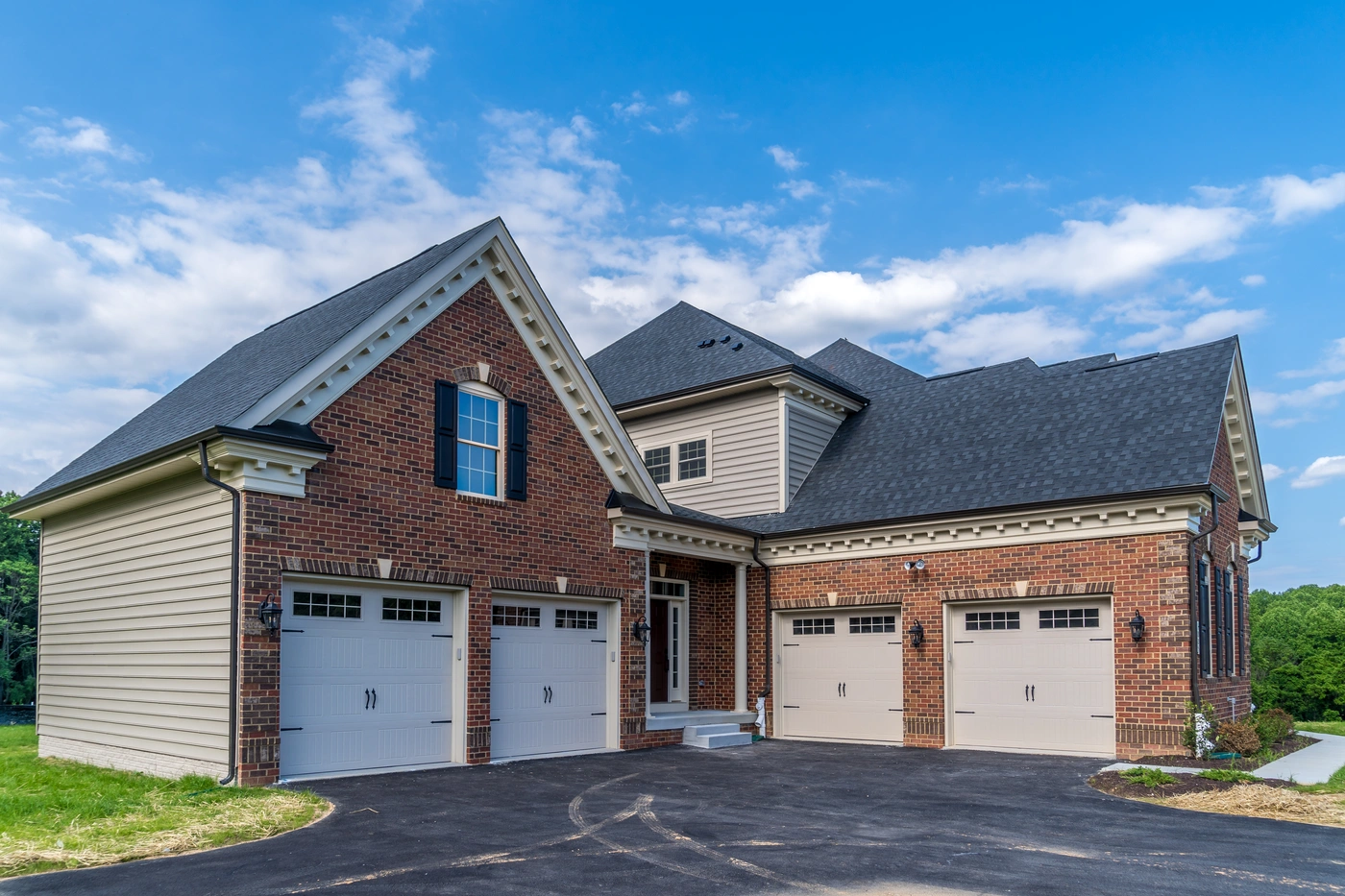 Brick home after storm damage roof repair in Edmond OK