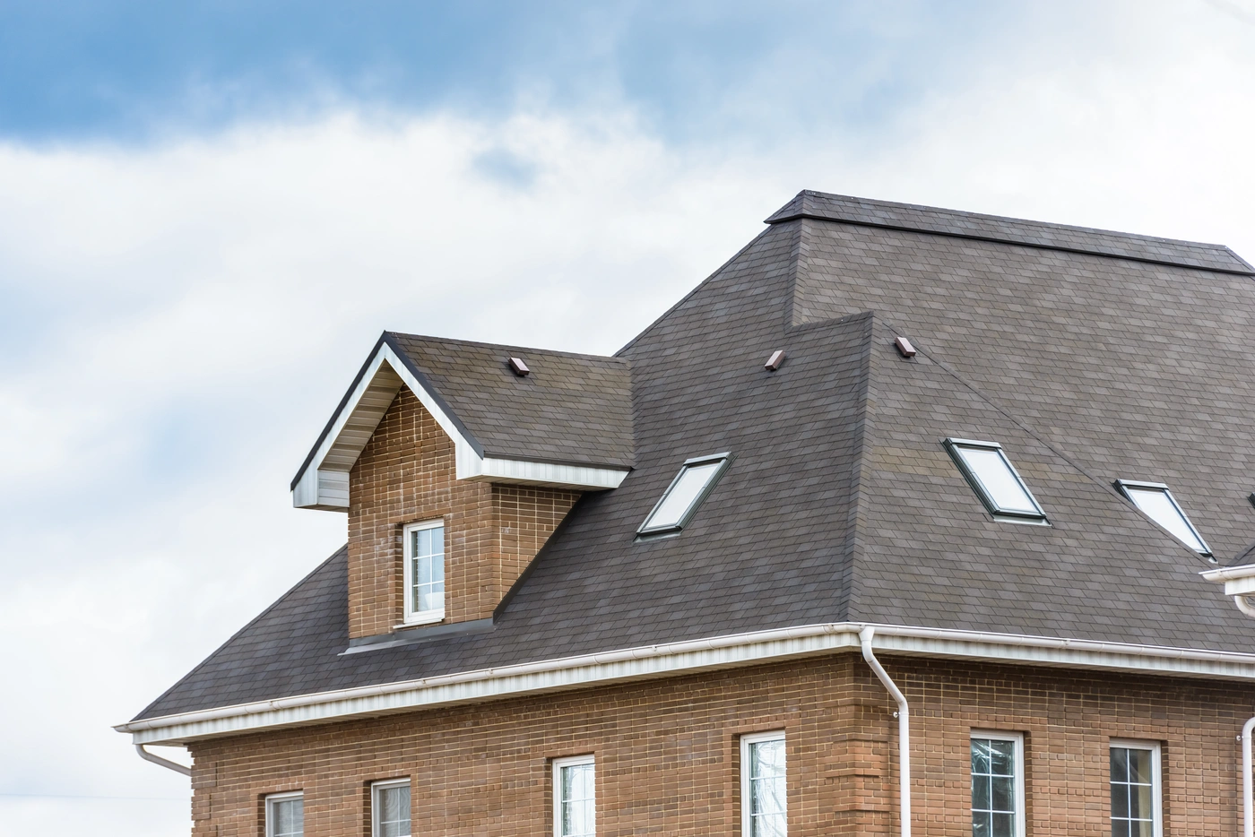 shingle roof repair after storm in nichols hills ok on brick home