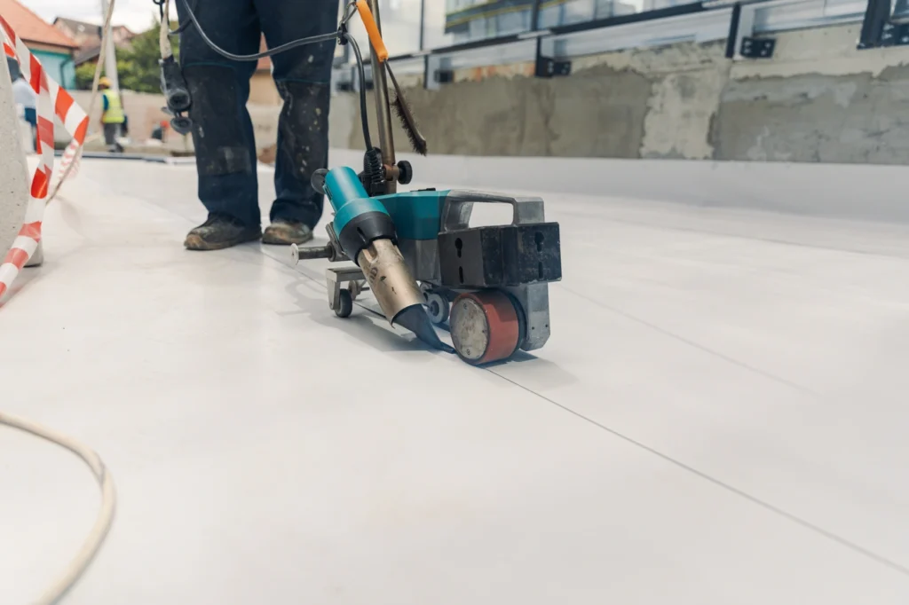 close up of tpo roof installation on commercial building in oklahoma
