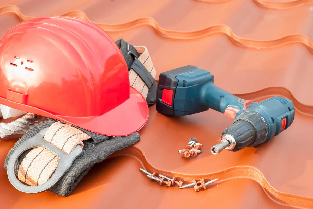 roofing tools on metal roof