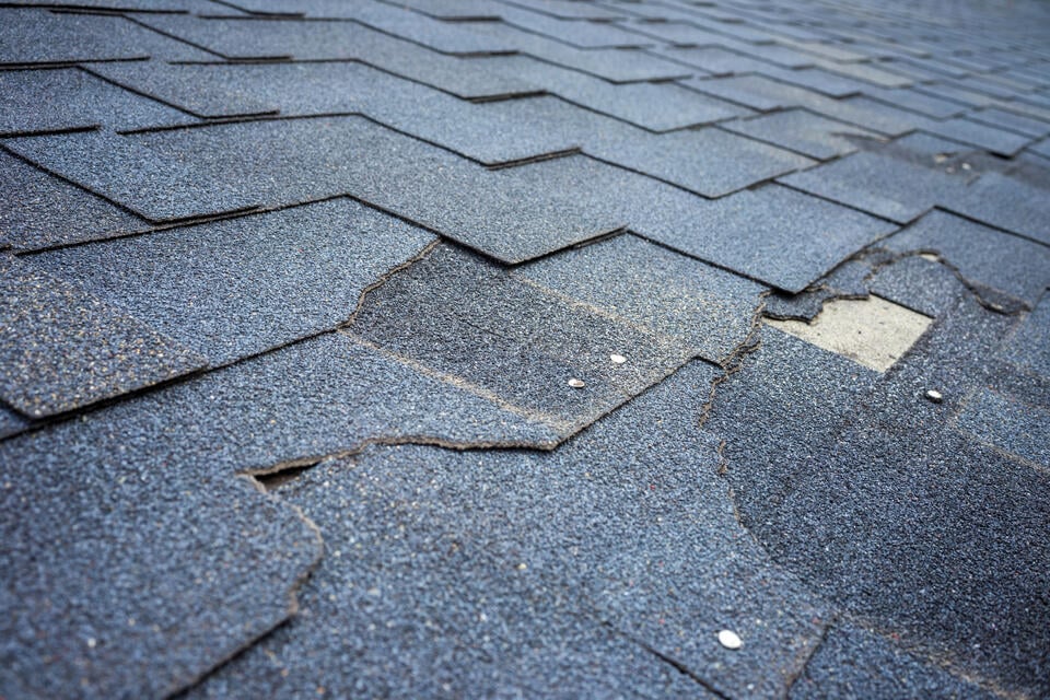 repair or replace roof-section of a shingled roof with damaged shingles