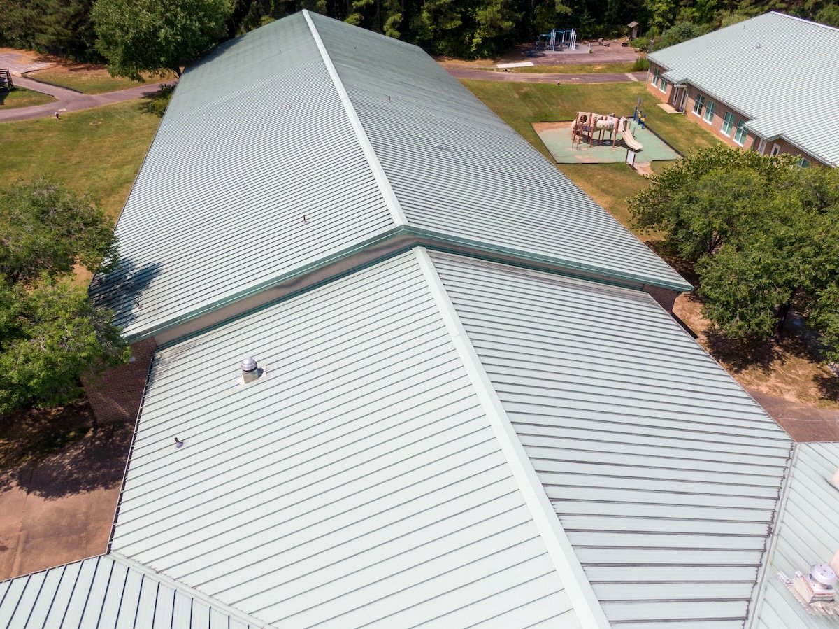 large commercial metal roof installation