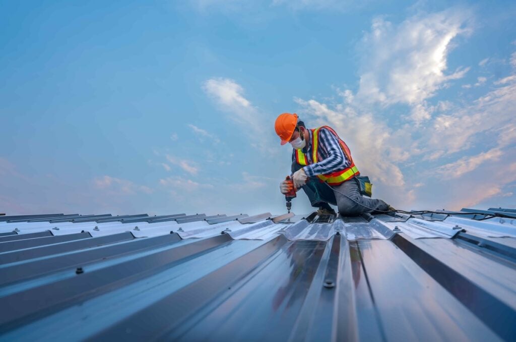 roofer installing commercial roof