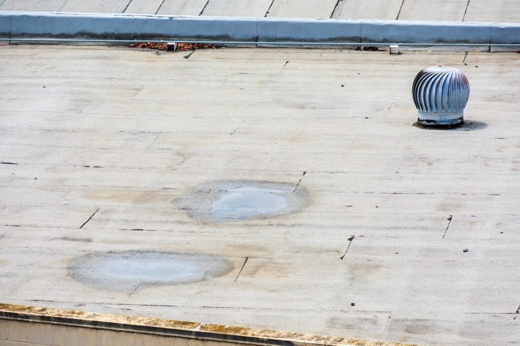 pooling water flat commercial roof