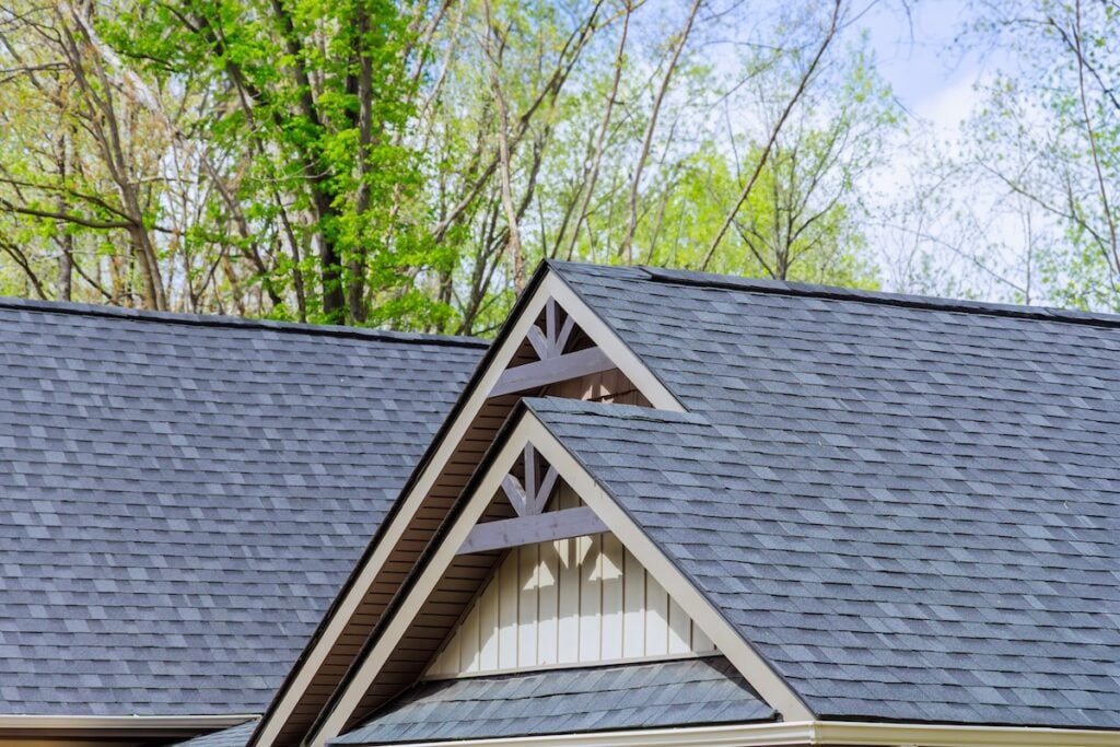 Roofing shingles cover roof top of newly constructed house