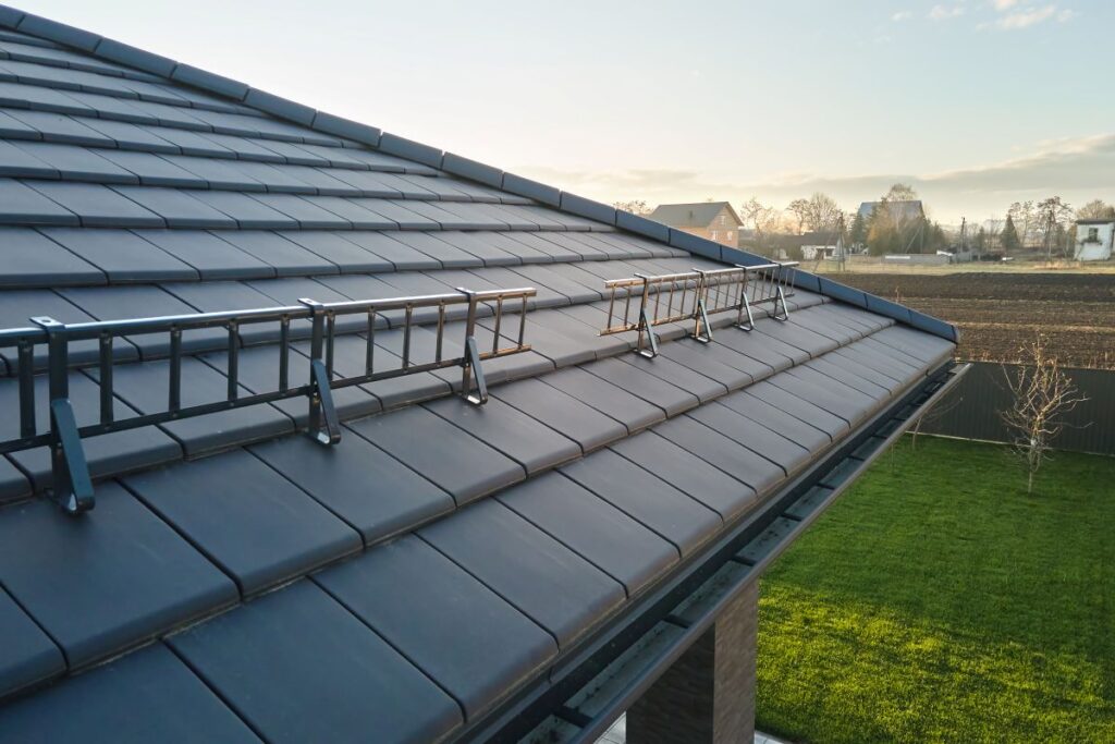 types of metal roofing modern dark grey snow guards