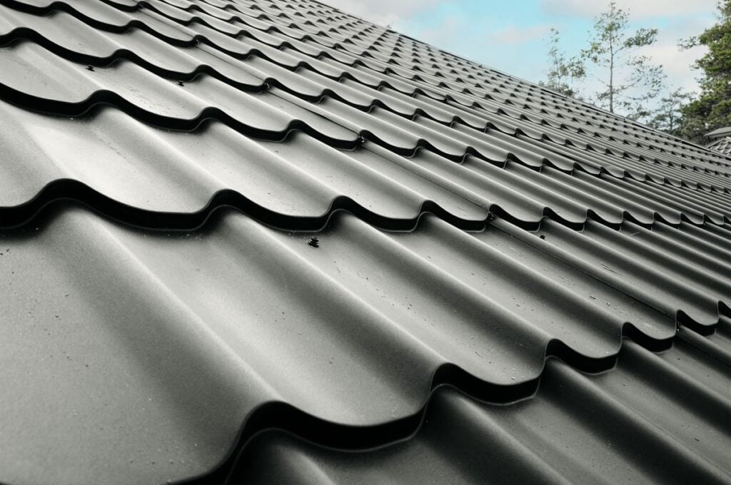 burnished slate metal roofing closeup metallic black roof sunny weather