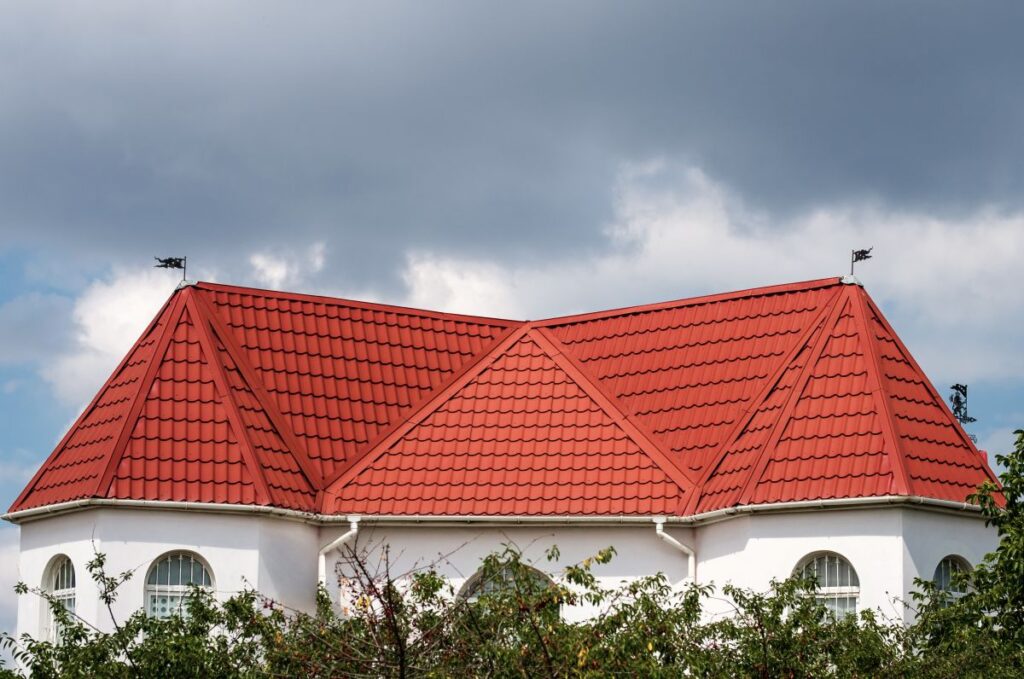orange metal shingles big house roof