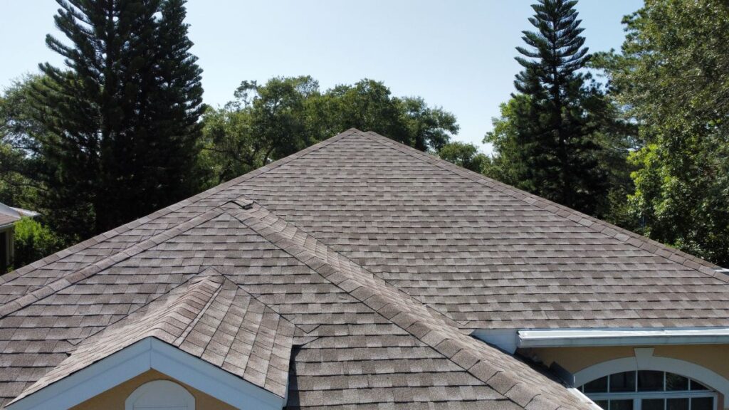 aerial drone photo of shingle roof of house