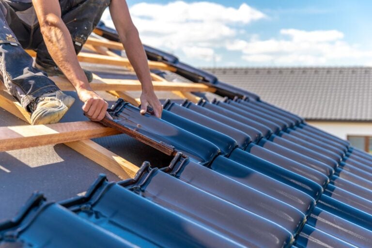 production of roofs from ceramic fired tiles on a family house